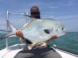 Simon Becker does the guiding and photography for a great capture, 25 pounds of permit.